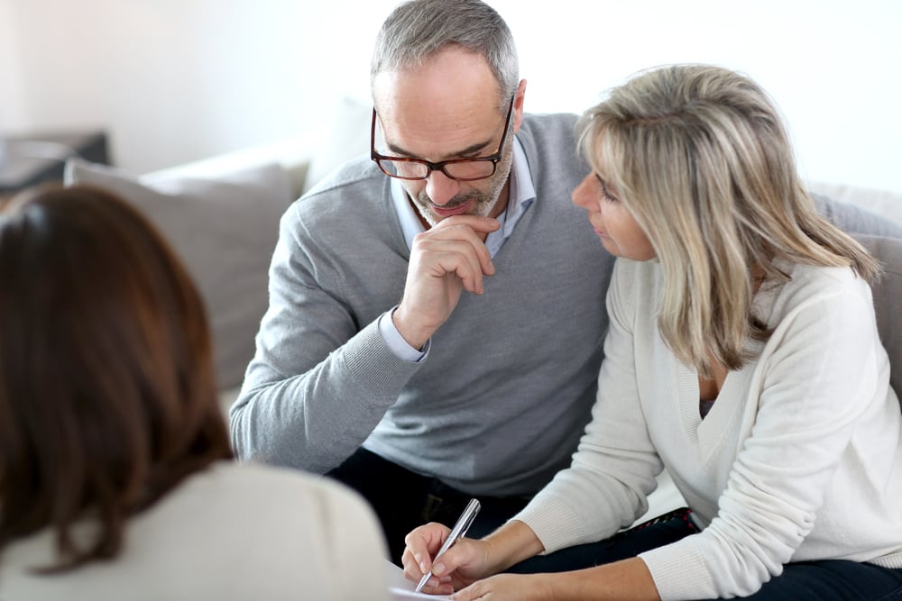 Senior couple meeting financial adviser for investment Senior couple meeting financial adviser for investment