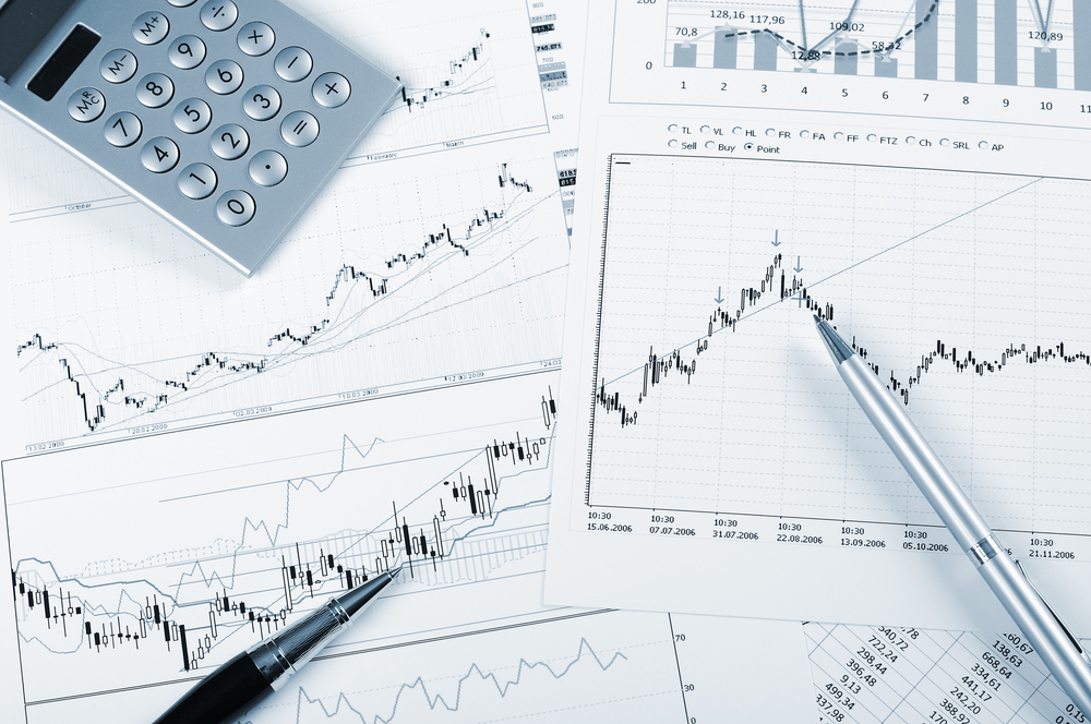 charts and graphs of sales of securities - workplace successful business man charts and graphs of sales of securities - workplace successful business man